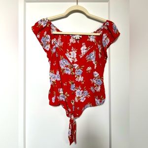 Slightly cropped floral top with tie front